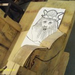 Neptune in paper back of chair early stages